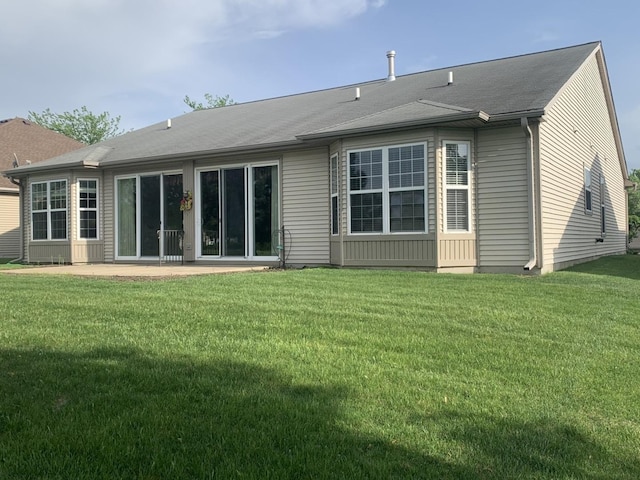 644 Tuscan Vw, Elgin, IL 60124 - rear view of property with a lawn and a patio area
