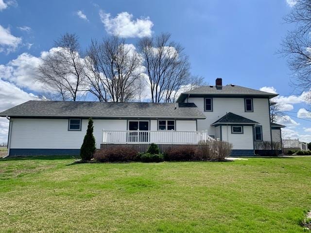 2700 E 600 N Rd, Milford, IL 60953 - back of property with a yard, a chimney, and a deck