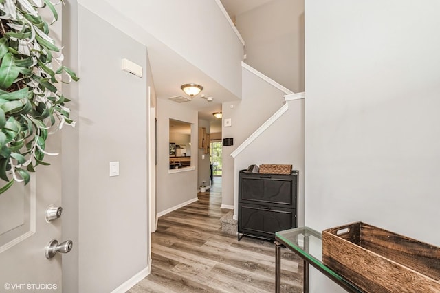 3095 Courtland St Unit 0, Woodstock, IL 60098 - entryway featuring baseboards, light wood finished floors, and visible vents