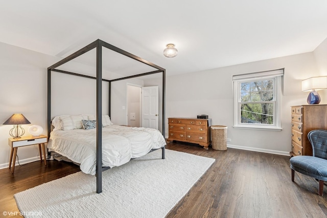 1404 Lincoln St, Evanston, IL 60201 - bedroom featuring baseboards and wood finished floors