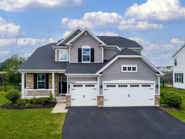 9303 Enstrom Ln, Huntley, IL 60142 - view of front of property featuring asphalt driveway, a porch, a shingled roof, and an attached garage
