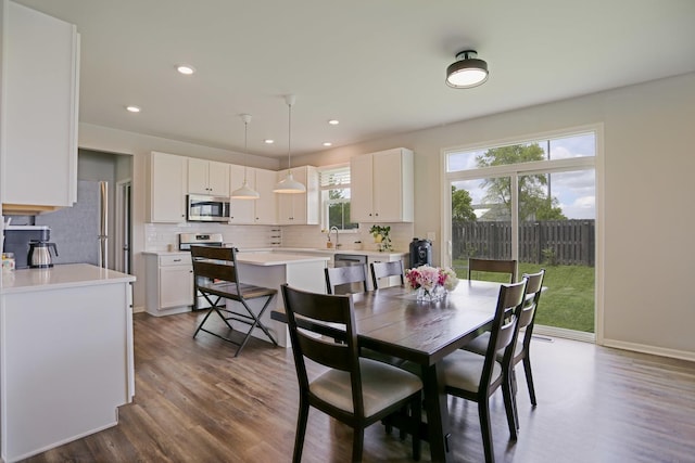 9303 Enstrom Ln, Huntley, IL 60142 - dining room featuring dark wood-style floors and recessed lighting