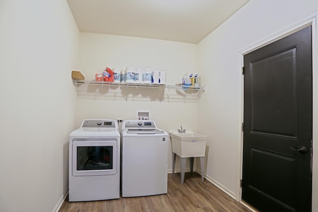 9303 Enstrom Ln, Huntley, IL 60142 - washroom featuring washing machine and dryer and wood finished floors