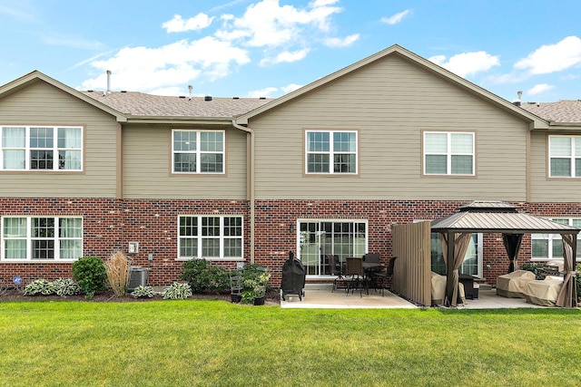 9356 Parkwood Ln, Tinley Park, IL 60487 - rear view of property with a gazebo, a patio area, brick siding, and a lawn