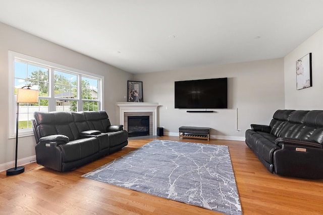 9356 Parkwood Ln, Tinley Park, IL 60487 - living area featuring wood finished floors, baseboards, and a fireplace with flush hearth