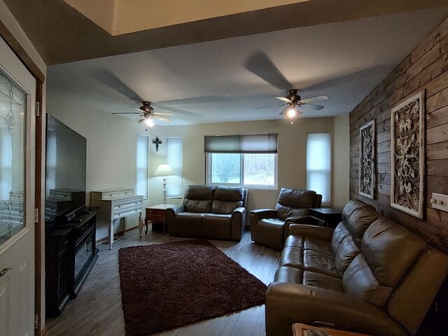 9582 Beaver Valley Rd, Belvidere, IL 61008 - living room with dark wood-style floors and ceiling fan