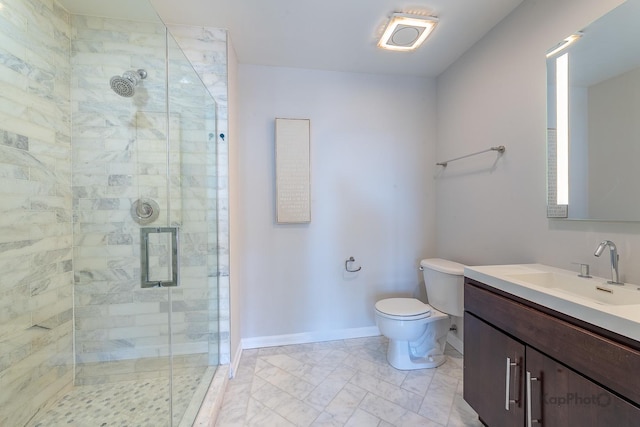 full bathroom with toilet, baseboards, marble finish floor, a shower stall, and vanity