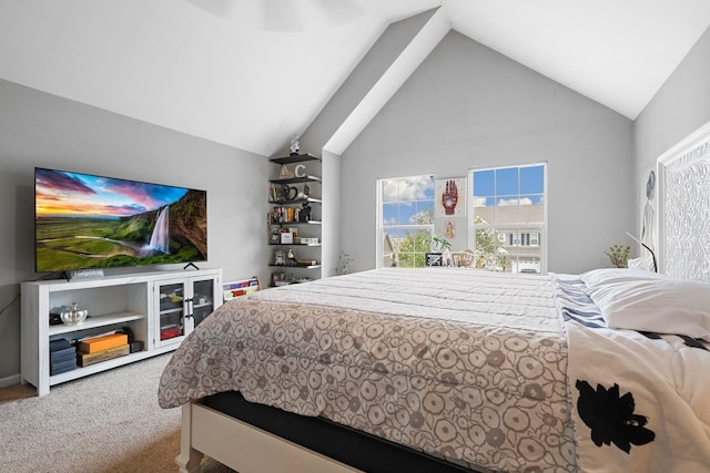 carpeted bedroom with vaulted ceiling