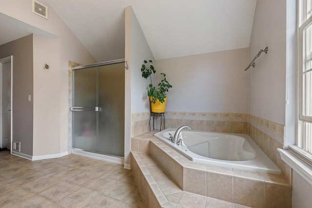 full bathroom featuring tile patterned floors, a shower stall, lofted ceiling, visible vents, and a bath