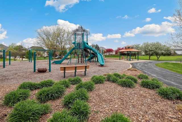 view of property's community with a lawn