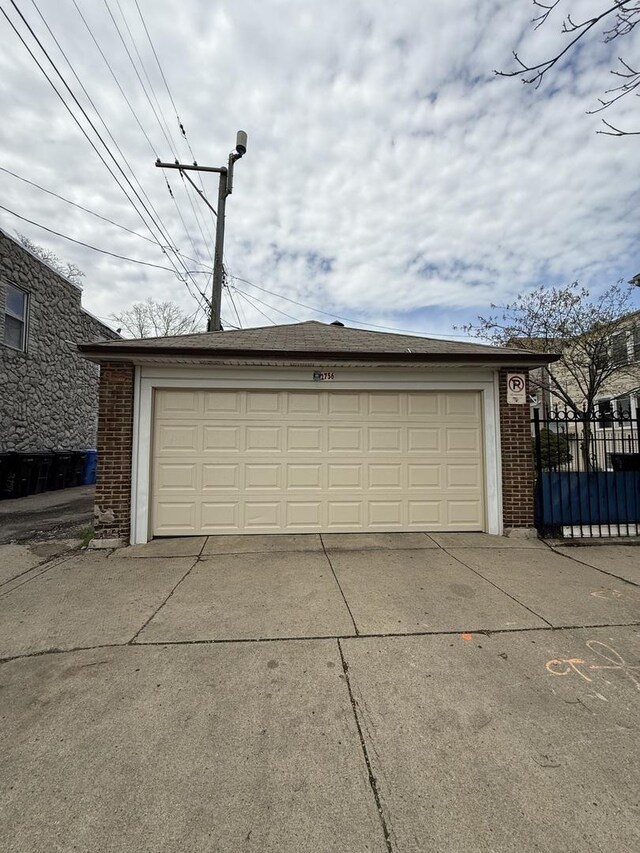 detached garage with fence