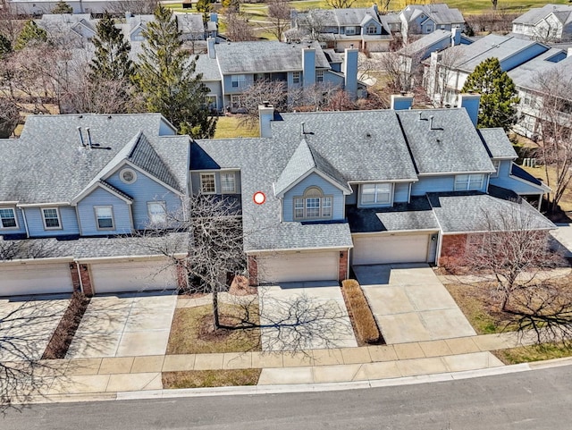 drone / aerial view with a residential view