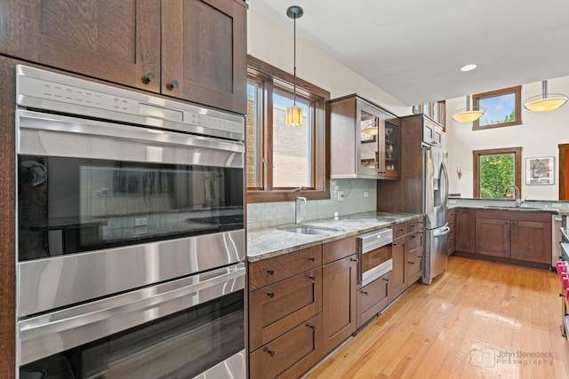 9515 S Damen Ave, Chicago, IL 60643 - kitchen with a sink, appliances with stainless steel finishes, tasteful backsplash, and light stone counters