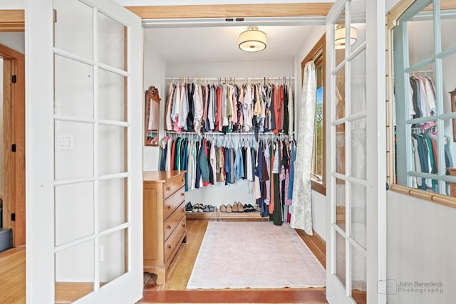 9515 S Damen Ave, Chicago, IL 60643 - spacious closet featuring french doors and light wood-type flooring