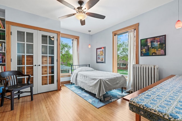 9515 S Damen Ave, Chicago, IL 60643 - bedroom with radiator heating unit, multiple windows, french doors, and access to outside