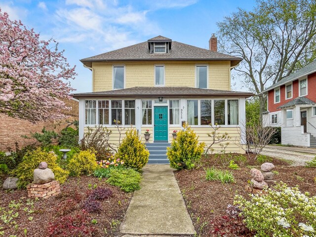 9515 S Damen Ave, Chicago, IL 60643 - traditional style home featuring a shingled roof, a chimney, and a sunroom