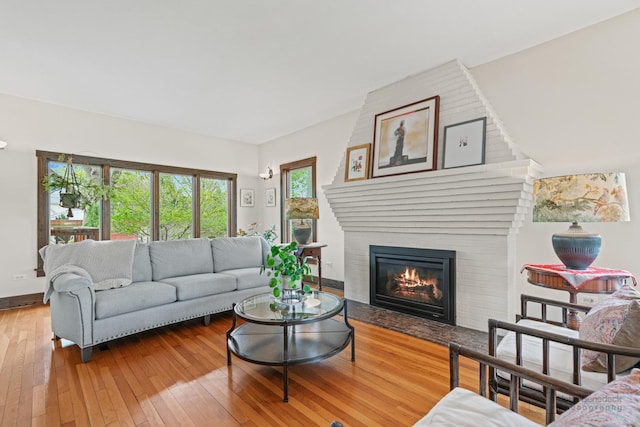 9515 S Damen Ave, Chicago, IL 60643 - living area featuring baseboards, hardwood / wood-style floors, and a fireplace