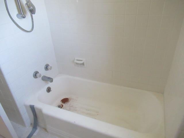 full bathroom with shower / bath combination