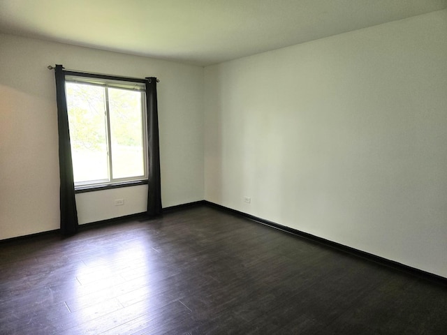 5116 Beechwood Ave, Gurnee, IL 60031 - spare room with dark wood finished floors and baseboards