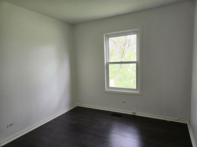 5116 Beechwood Ave, Gurnee, IL 60031 - empty room featuring baseboards and dark wood-type flooring