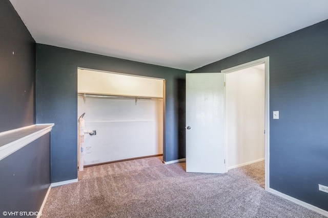 5116 Beechwood Ave, Gurnee, IL 60031 - unfurnished bedroom featuring carpet, a closet, and baseboards