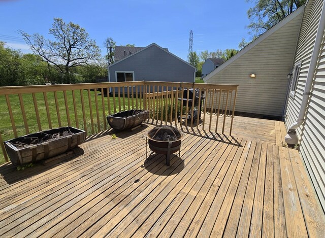 5116 Beechwood Ave, Gurnee, IL 60031 - wooden deck with a fire pit and a lawn