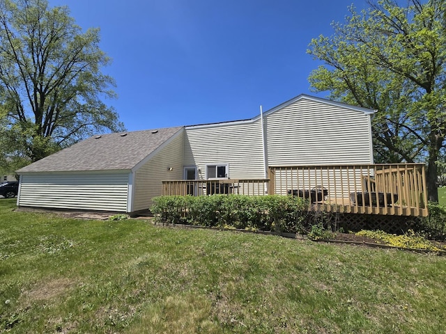 5116 Beechwood Ave, Gurnee, IL 60031 - view of side of property featuring a wooden deck, a shingled roof, and a lawn