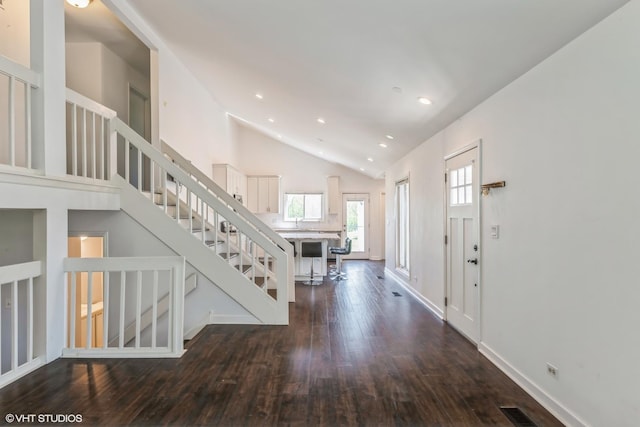 5116 Beechwood Ave, Gurnee, IL 60031 - entryway with hardwood / wood-style flooring, baseboards, stairway, recessed lighting, and high vaulted ceiling