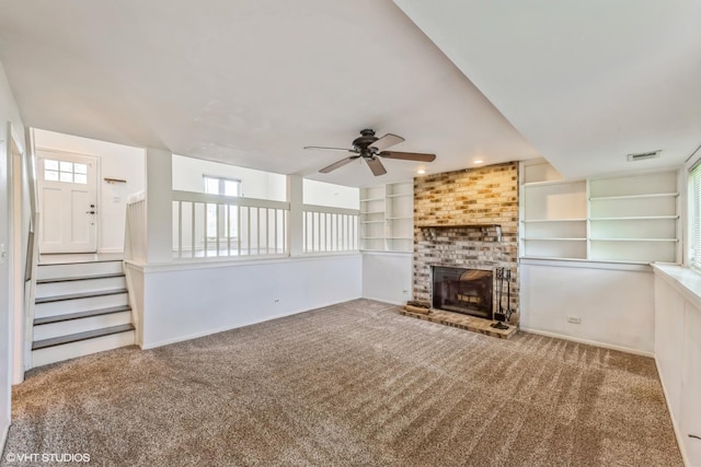 5116 Beechwood Ave, Gurnee, IL 60031 - unfurnished living room featuring carpet, a ceiling fan, a fireplace, built in shelves, and recessed lighting