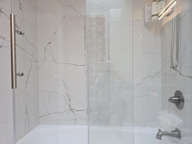 bathroom with washtub / shower combination