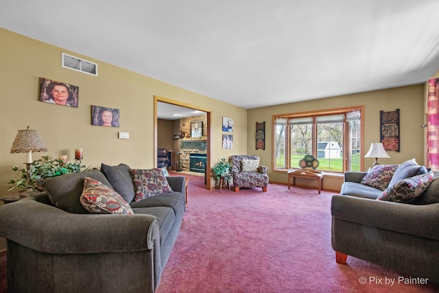 3518 James Way, Johnsburg, IL 60051 - living area with carpet flooring, visible vents, and a stone fireplace