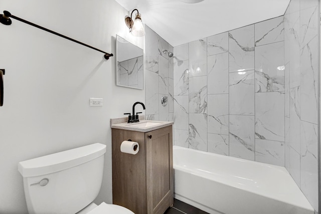 bathroom featuring vanity,  shower combination, and toilet