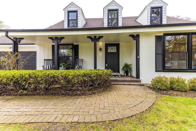 property entrance featuring covered porch