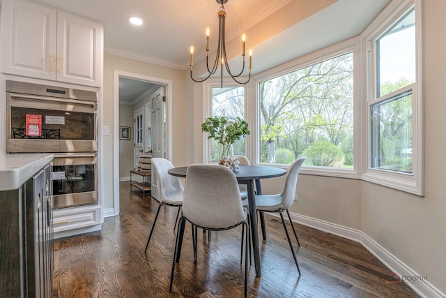 dining room featuring ornamental molding, baseboards, dark wood-style floors, recessed lighting, and a notable chandelier