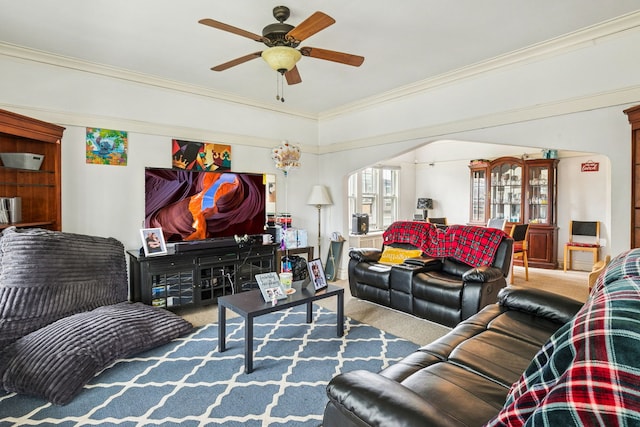 1127 Lathrop Ave, Forest Park, IL 60130 - carpeted living area with crown molding, arched walkways, and ceiling fan