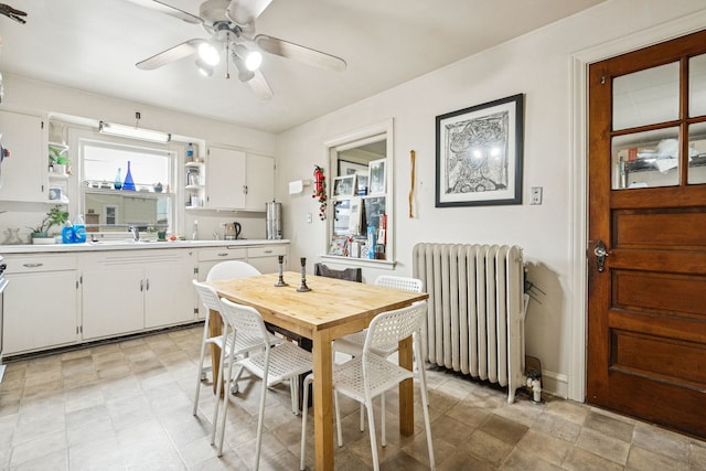 1127 Lathrop Ave, Forest Park, IL 60130 - dining space featuring radiator and ceiling fan