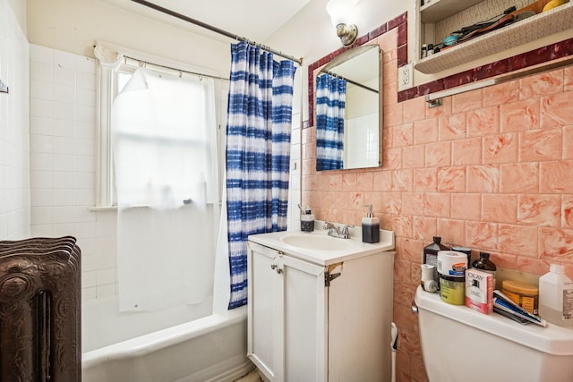 1127 Lathrop Ave, Forest Park, IL 60130 - bathroom with tile walls, tasteful backsplash, shower / tub combo, vanity, and toilet