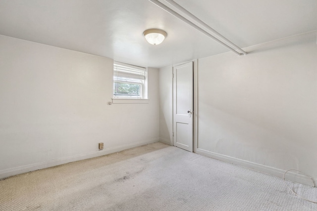 1127 Lathrop Ave, Forest Park, IL 60130 - spare room featuring carpet flooring and baseboards