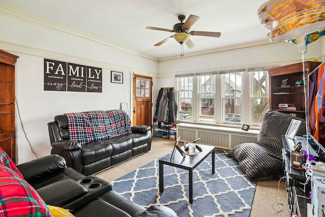 1127 Lathrop Ave, Forest Park, IL 60130 - living area featuring carpet floors, crown molding, ceiling fan, and radiator heating unit