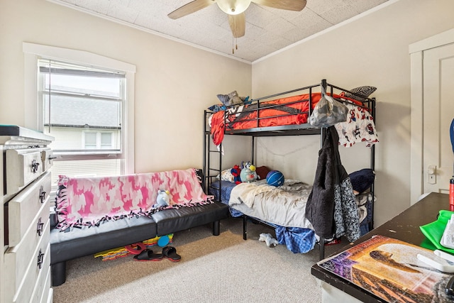 1127 Lathrop Ave, Forest Park, IL 60130 - bedroom featuring crown molding, a ceiling fan, and carpet flooring