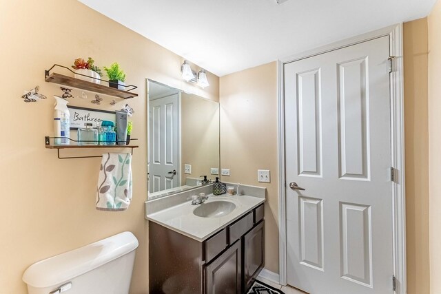 half bath with toilet and vanity