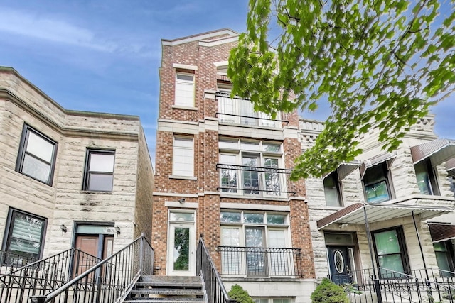 6527 S Drexel Ave, Chicago, IL 60637 - townhome / multi-family property featuring brick siding