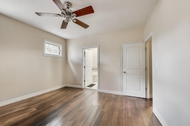 6527 S Drexel Ave, Chicago, IL 60637 - unfurnished bedroom featuring dark wood-style floors, baseboards, ensuite bath, and ceiling fan