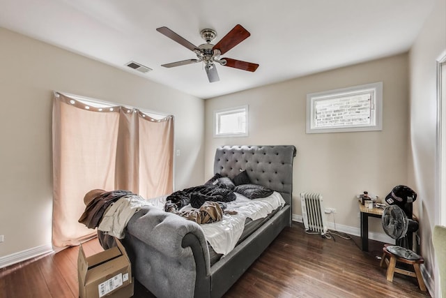 6527 S Drexel Ave, Chicago, IL 60637 - bedroom featuring radiator, baseboards, dark wood finished floors, and ceiling fan