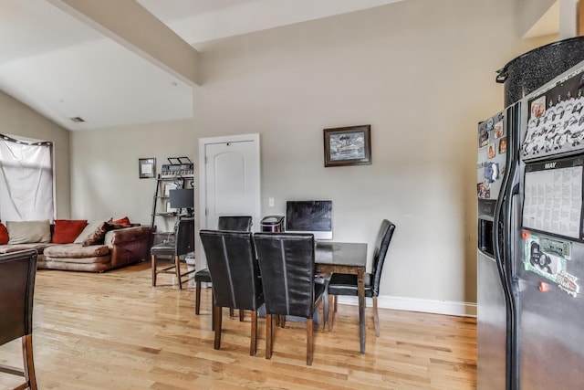 6527 S Drexel Ave, Chicago, IL 60637 - dining room with light wood-style flooring, lofted ceiling, and baseboards