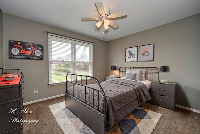 carpeted bedroom with baseboards and a ceiling fan