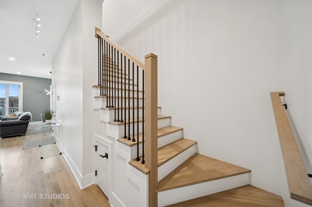4816 S St Lawrence Ave Unit 302, Chicago, IL 60615 - staircase featuring wood finished floors