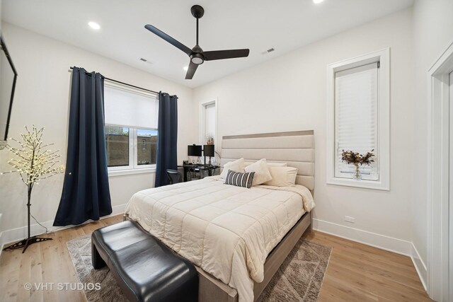 4816 S St Lawrence Ave Unit 302, Chicago, IL 60615 - bedroom with light wood-type flooring, baseboards, recessed lighting, and a ceiling fan