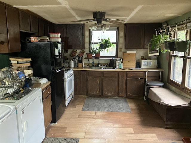 26862 W Longwood Dr, Ingleside, IL 60041 - kitchen featuring ceiling fan, a sink, light countertops, light wood finished floors, and white appliances