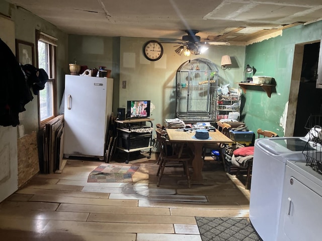 26862 W Longwood Dr, Ingleside, IL 60041 - dining area featuring light wood-style flooring, ceiling fan, radiator heating unit, and washing machine and clothes dryer